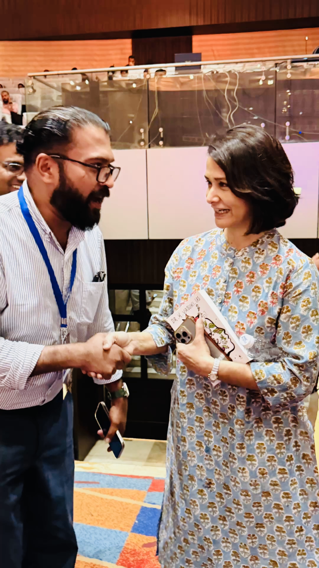 The Lyrabyte team discussing its products with an attendee